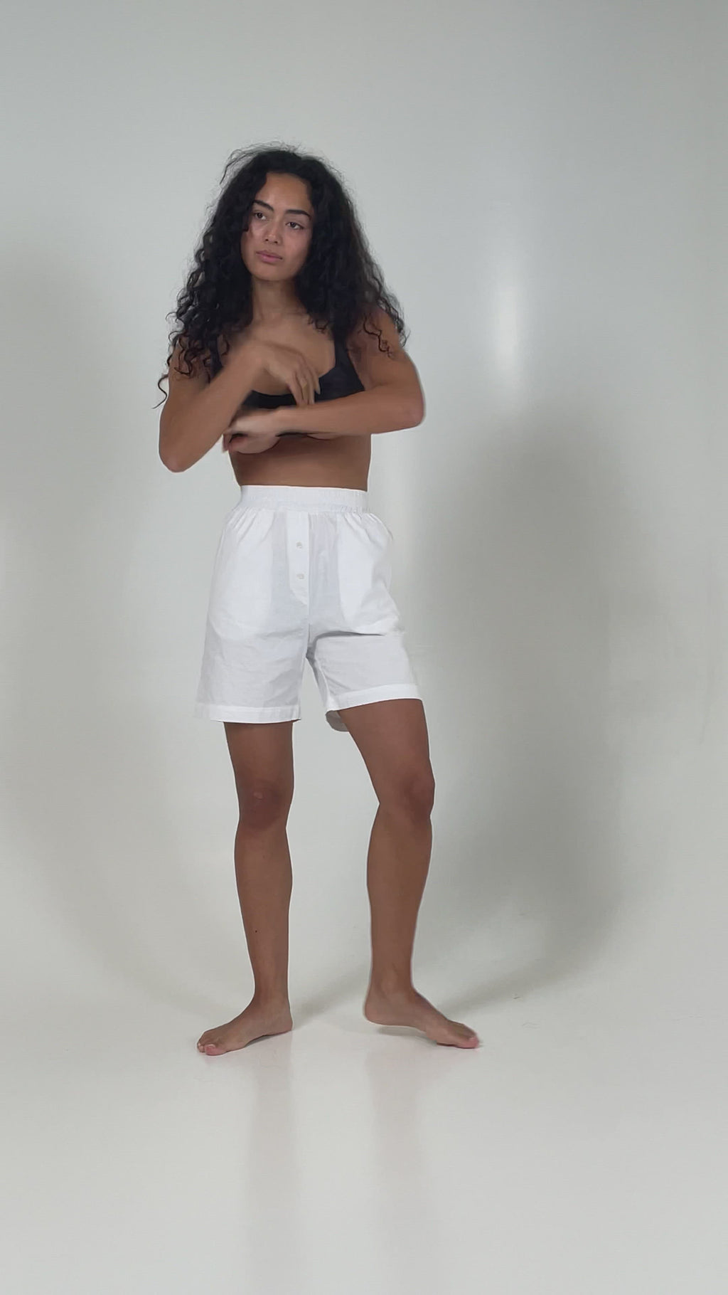 Video of girl wearing White high rise boxer shorts